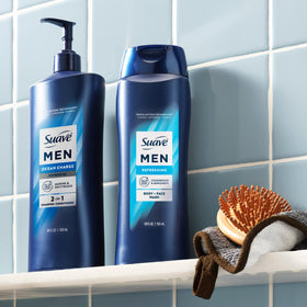 Four Suave bottles stacked to display the 4-count bulk convenience