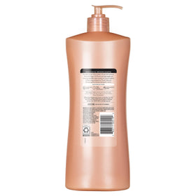 Suave Moroccan Infusion bottle staged in bathroom promoting everyday use