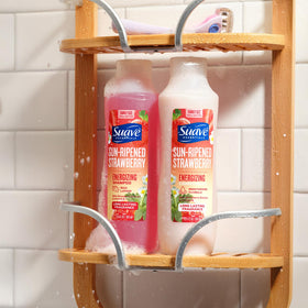 Suave duo staged with strawberries and peaches, conveying bright fragrance appeal