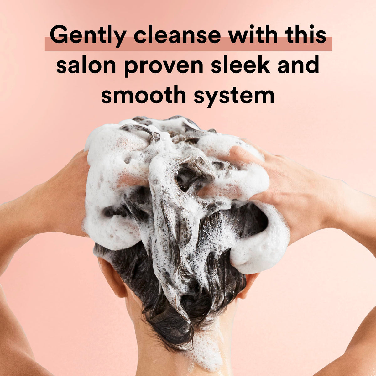 Suave bottle in hand applying to wet hair demonstrating effective cleansing and frizz control
