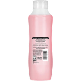 Shower scene with Suave bottle on ledge, creates fragrant shower experience