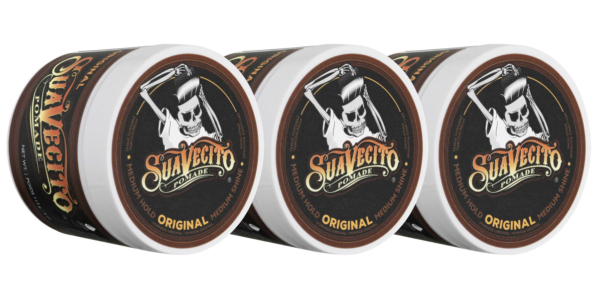 Suavecito front tin showing branding and product benefit of medium hold