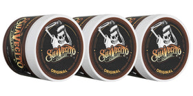 Suavecito front tin showing branding and product benefit of medium hold