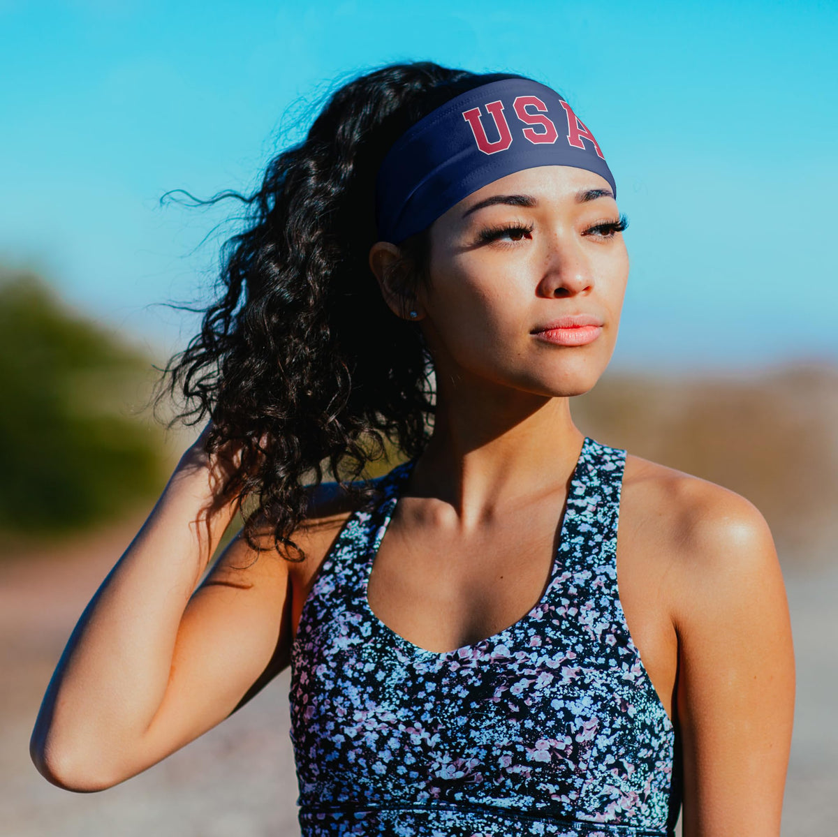 Suddora headband in hand showing 3.5 inch width and size clarity