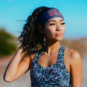 Suddora headband in hand showing 3.5 inch width and size clarity