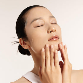 Sulwhasoo sheet mask applied on face showing cooling hydration effect