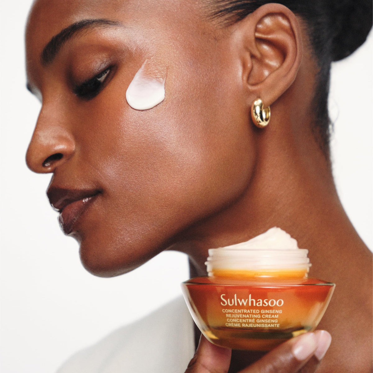Sulwhasoo open jar top view showing cream surface and luxurious use