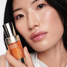 Sulwhasoo serum texture on hand showing smooth, hydrating finish for plumpness