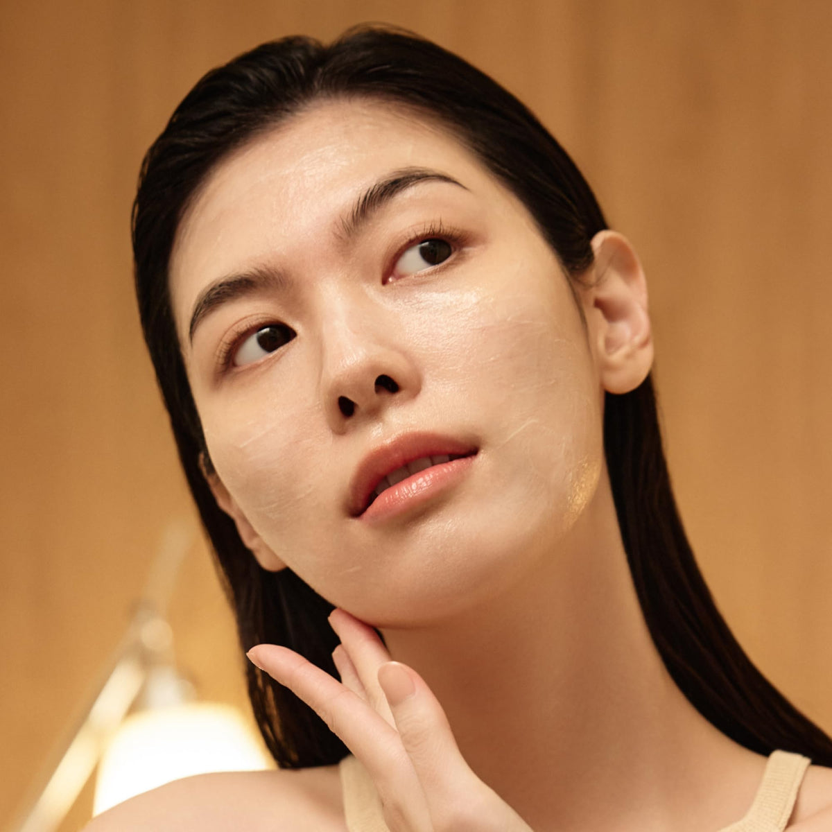 Sulwhasoo jar in hand for scale showing product size and travel-friendly benefit