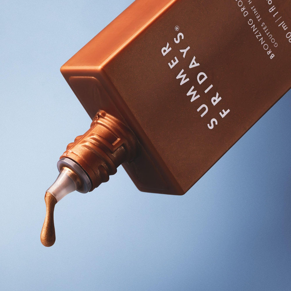 Summer Fridays bronzing drops pipette dispensing drop, demonstrates easy, precise application
