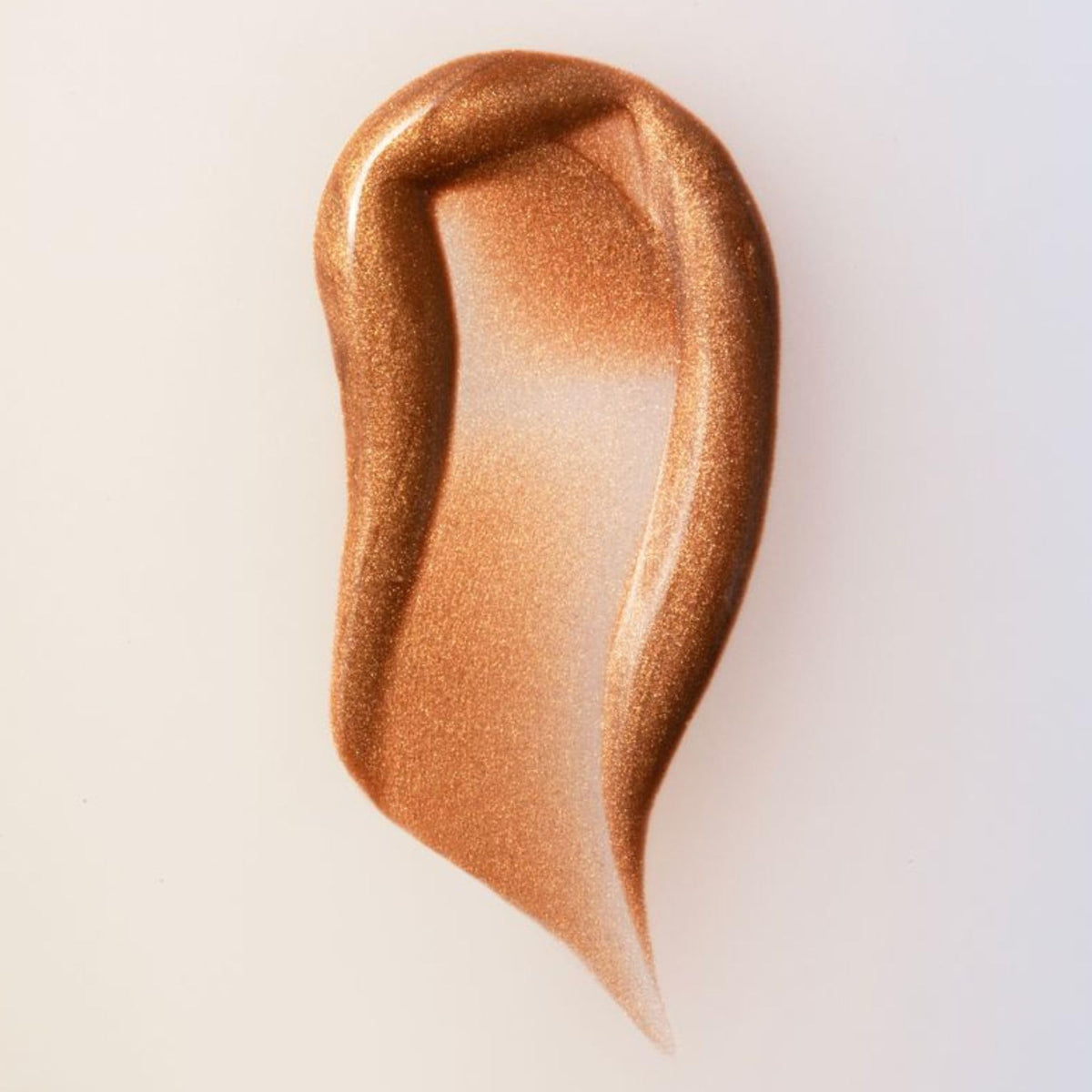 Summer Fridays bronzing drops serum texture on hand highlighting hydrating, lightweight finish