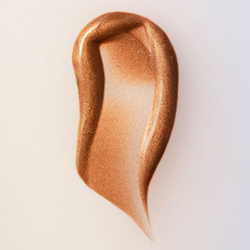 Summer Fridays bronzing drops serum texture on hand highlighting hydrating, lightweight finish