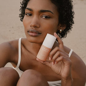 Summer Fridays serum next to moisturizer and SPF to show layering benefits