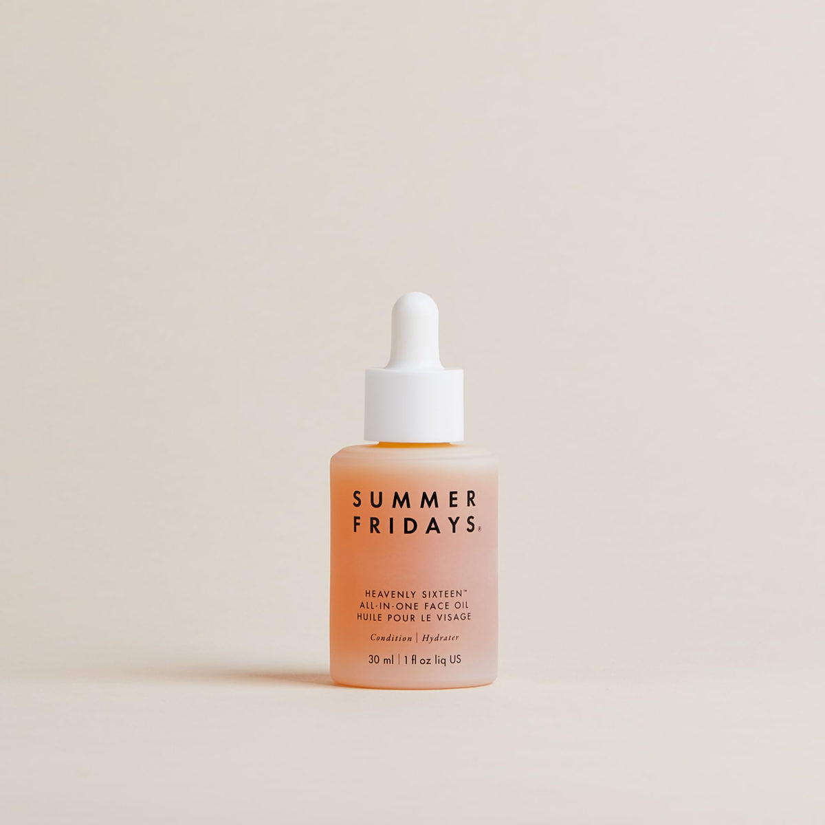 Summer Fridays applied on model's glowing cheek, conveys plumped, luminous skin effect