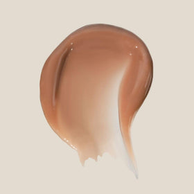 Summer Fridays open lip balm showing creamy texture and easy application benefit
