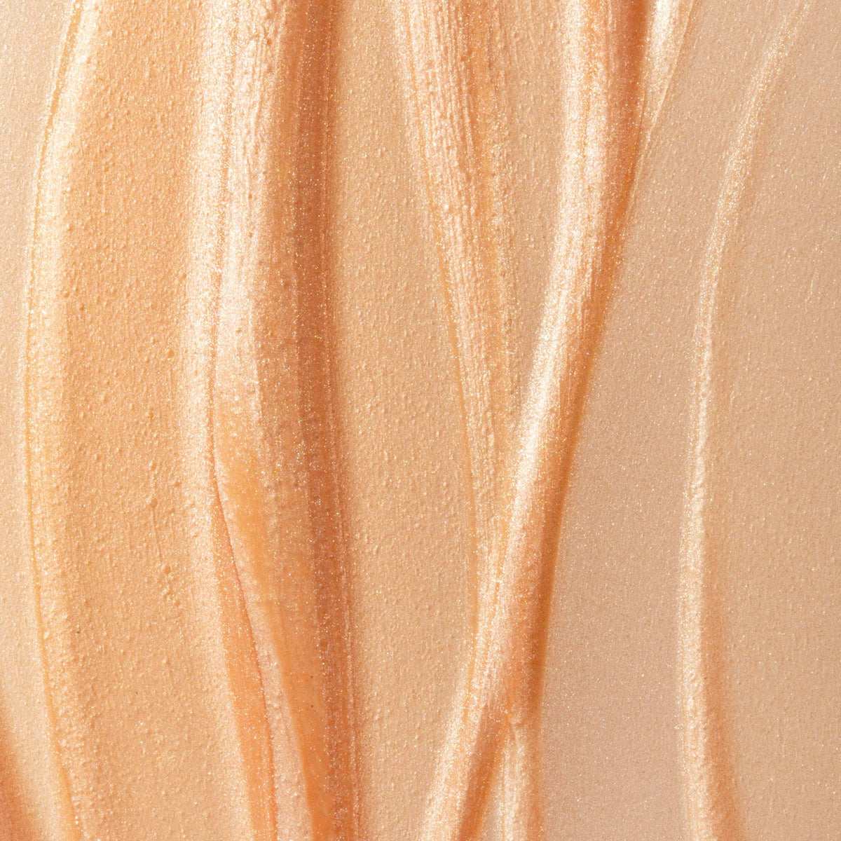 Summer Fridays product on model's cheek with glass skin effect, illustrates dewy finish