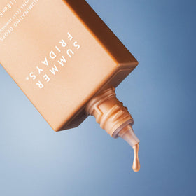 Summer Fridays close-up texture on fingertip, shows lightweight hydrating consistency