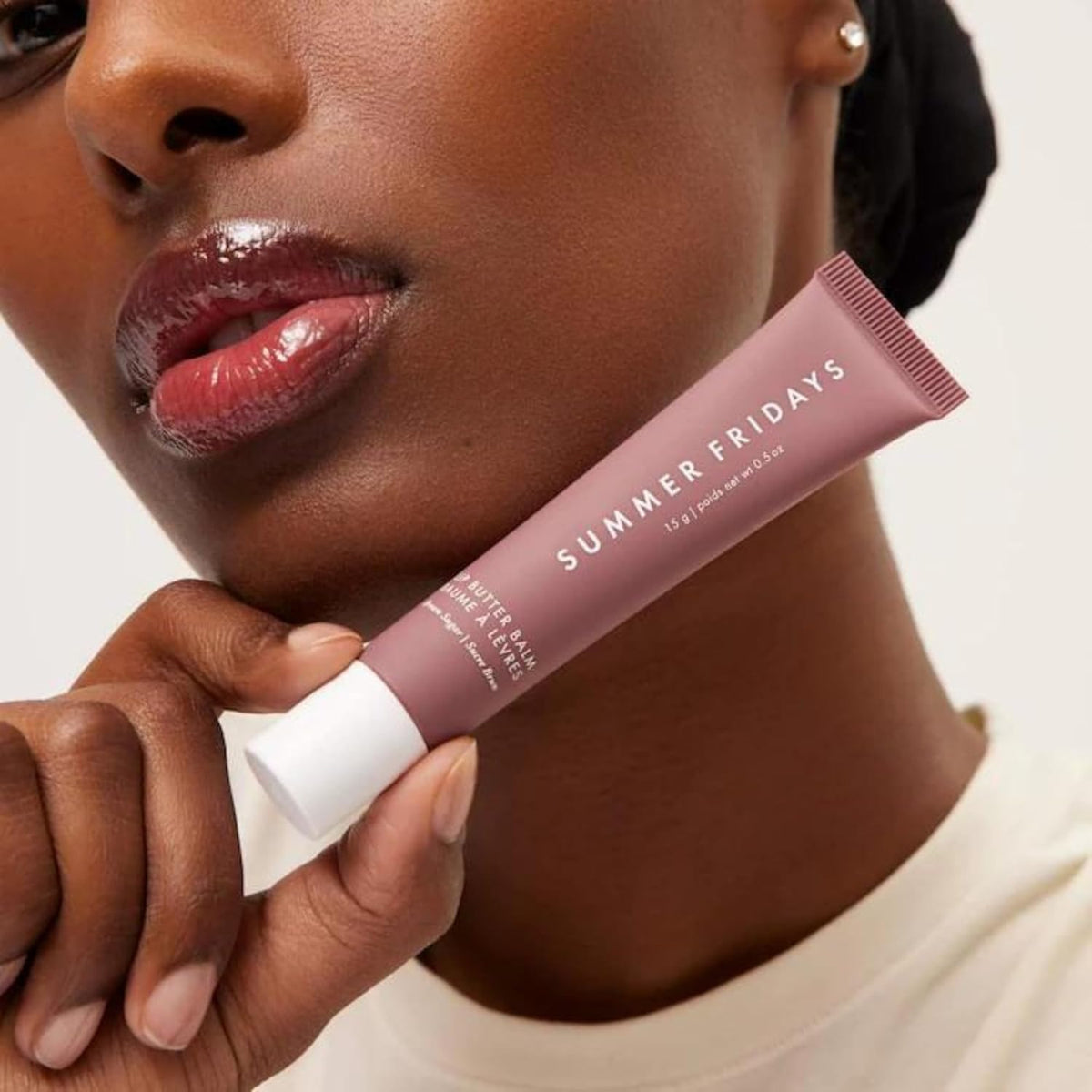 Summer Fridays balm in use applying sheer color and instant shine