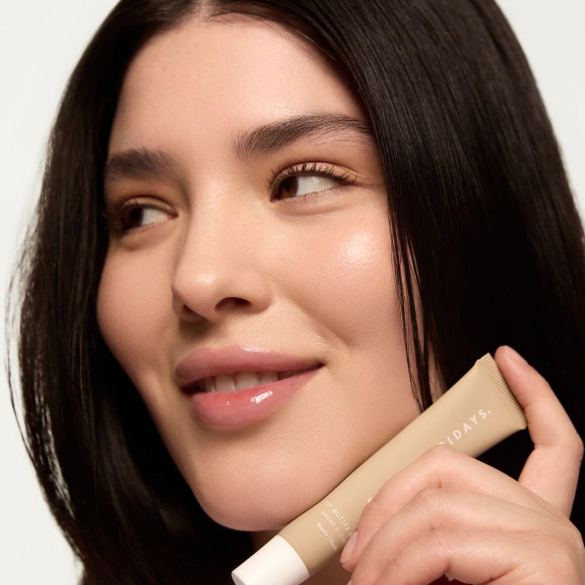 Summer Fridays sheer-tint swatch on skin showing natural glossy finish