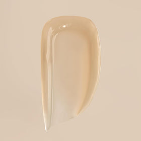 Summer Fridays tube open with balm on fingertip demonstrating smooth application