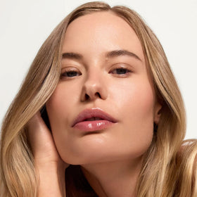 Summer Fridays applied on medium skin model demonstrating cool peach undertones benefit