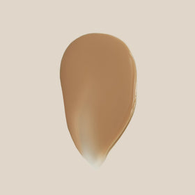 Summer Fridays close-up texture drop showcasing dewy formula that blends smoothly