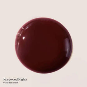 Summer Fridays texture close-up showing glossy oil reflecting light for hydrated lips