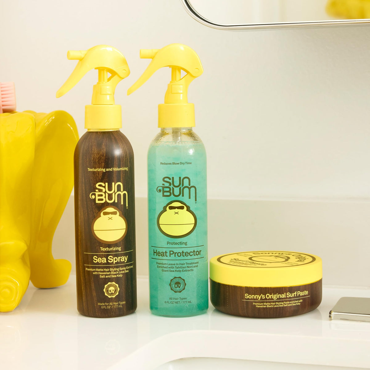 Sun Bum in-use with blow dryer showing protection and faster dry times during styling