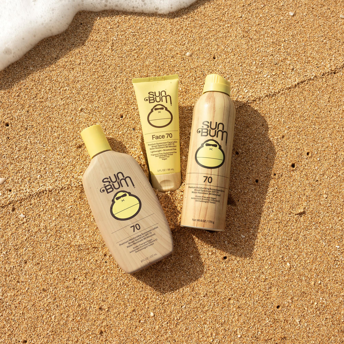 Sun Bum in-use at beach demonstrating easy application and broad coverage