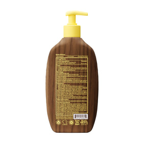 Sun Bum sunscreen in a beach setting with person applying for reliable outdoor protection