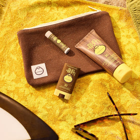 Open Sun Bum Original Lip Balm SPF 30 Coconut showing smooth balm for hydration