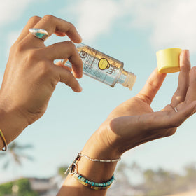 Sun Bum oil texture closeup showing silky consistency and quick absorption