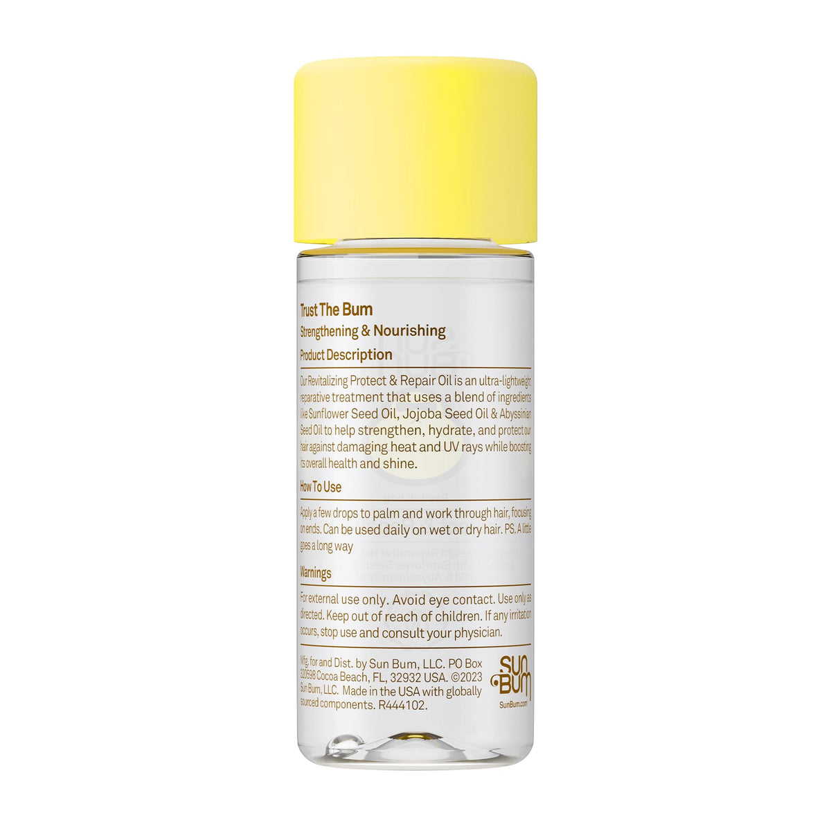 Sun Bum bottle beside a common item to show compact 1.7 oz travel-friendly size