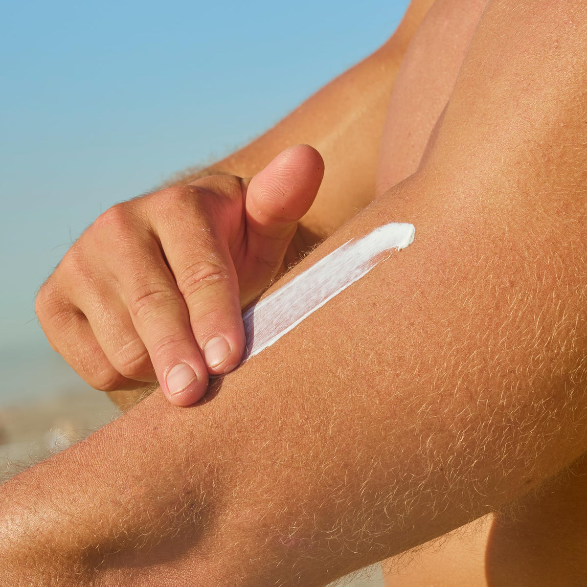 Sun Bum lotion texture close-up showing lightweight spreadability for smooth skin