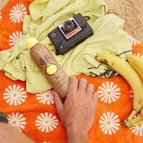 Sun Bum close-up of spray nozzle demonstrating easy application