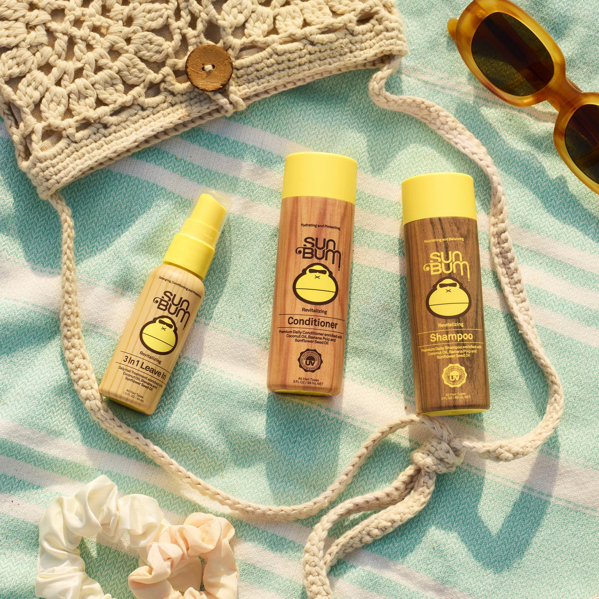 Sun Bum texture close-up on hair strand showing smooth, frizz-reduced finish