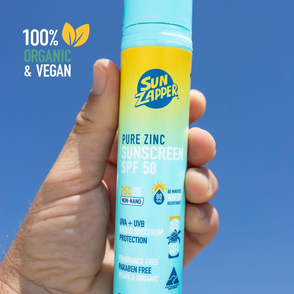 Sun Zapper in beach lifestyle setting showing reef-safe sunscreen benefit