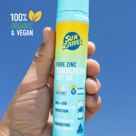 Sun Zapper in beach lifestyle setting showing reef-safe sunscreen benefit