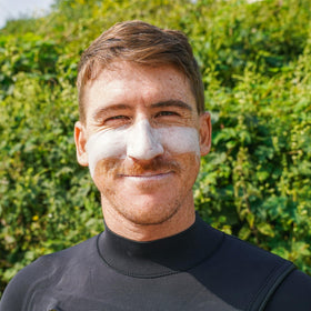 Sun Zapper on lips detail showing targeted protection benefit