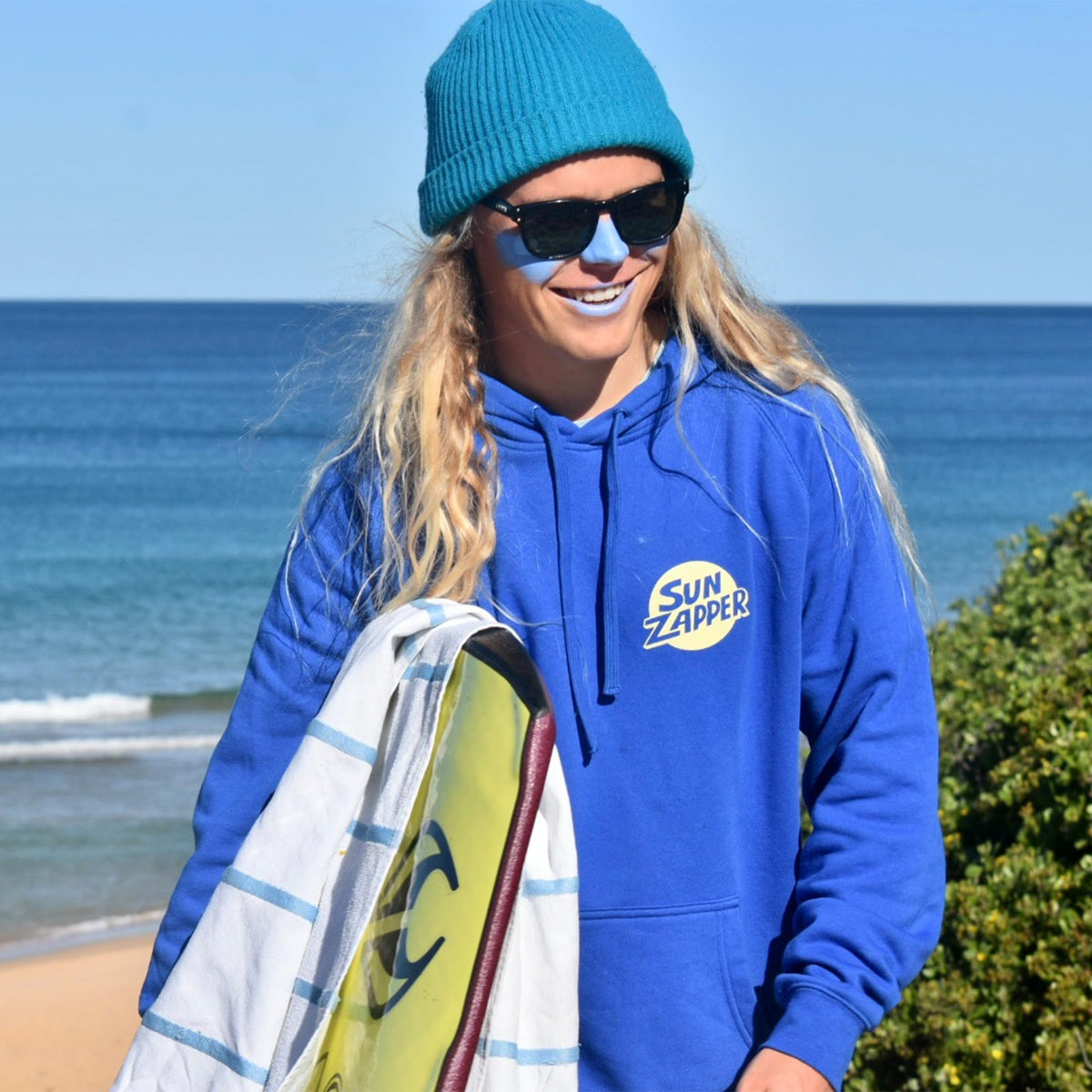 Sun Zapper inside surf bag showing durable stick resisting leaks and heat