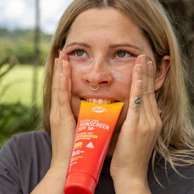 Sun Zapper poured on hand scale illustrating coverage and lightweight feel