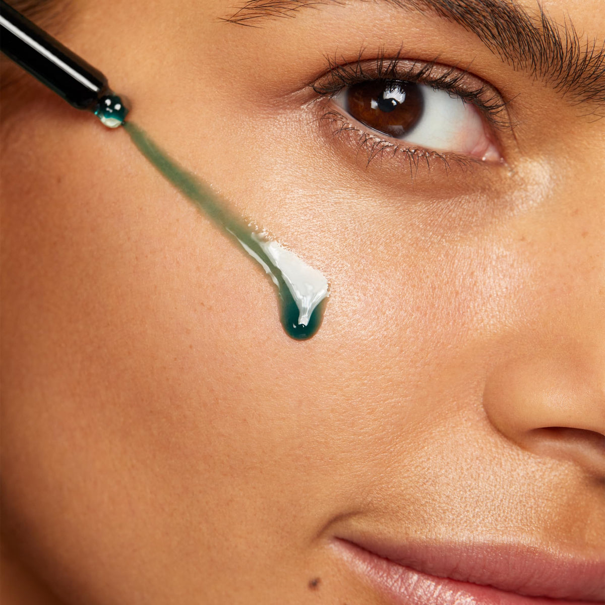 Sunday Riley Luna applied in nighttime routine, illustrating soothing overnight results
