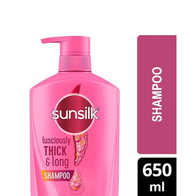 sunsilk bottle held in hand to show scale and travel convenience