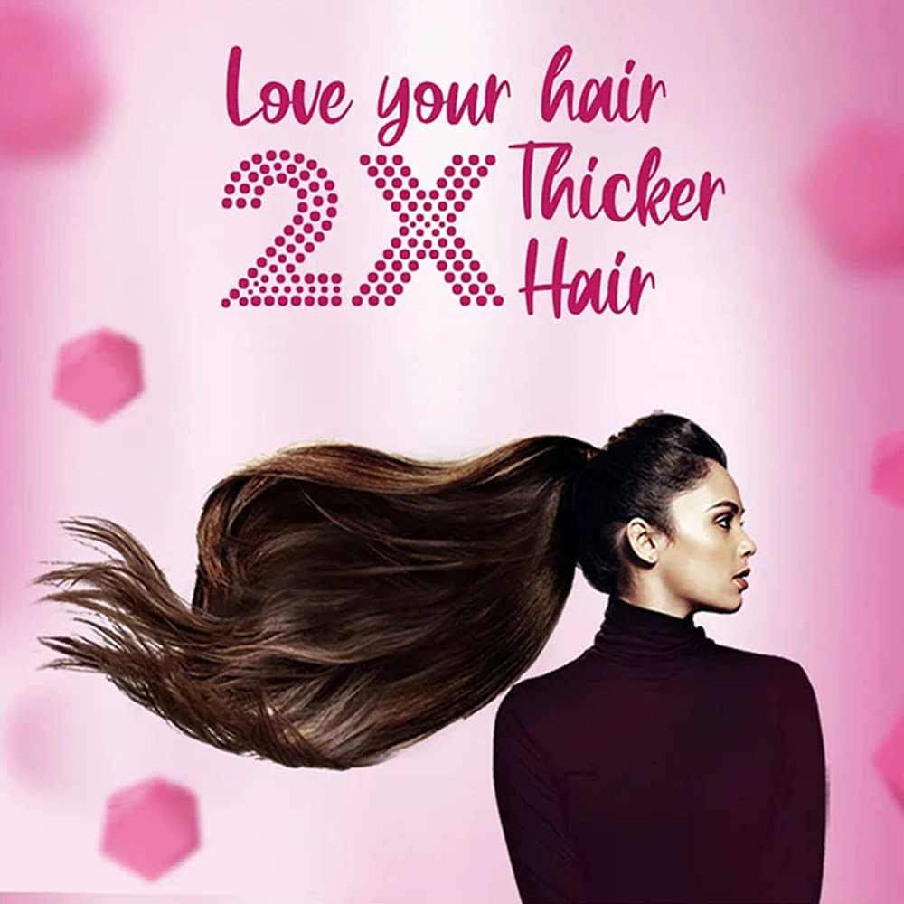 sunsilk shampoo poured into palm showcasing creamy formula