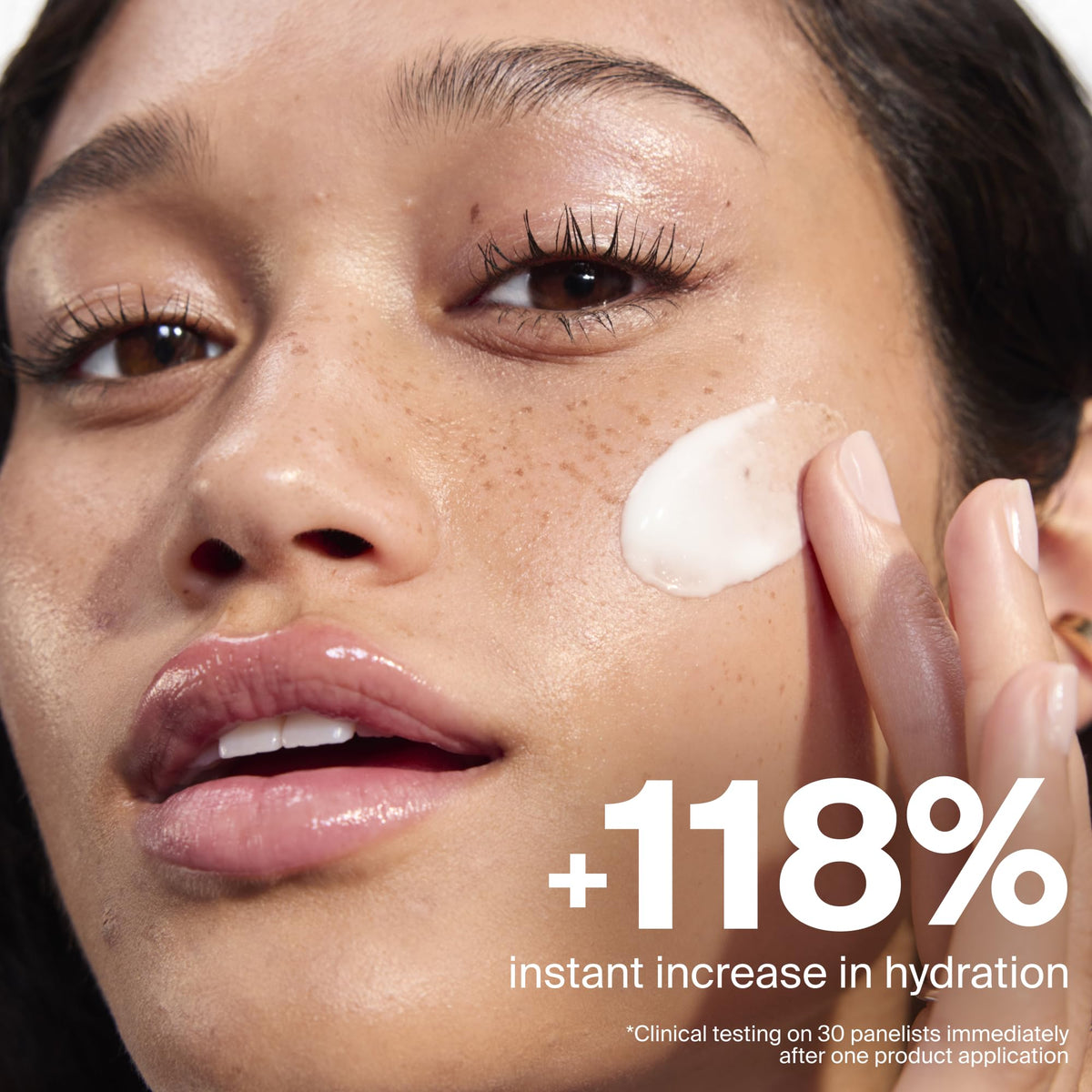 Supergoop! Dewscreen applied on model's face illustrating smooth primer finish