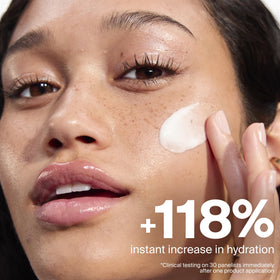 Supergoop! Dewscreen applied on model's face illustrating smooth primer finish