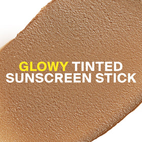 Supergoop! Glowscreen open stick angled to reveal tinted golden tip and easy application