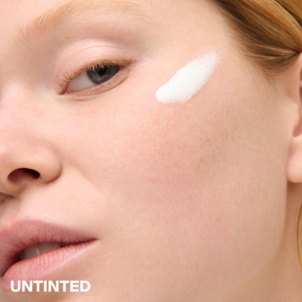 Supergoop! application on hand demonstrating blendable neutral tint