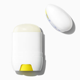 Supergoop! stick extended to show product length and easy dispensing