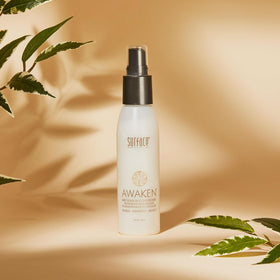 SURFACE Awaken Mist nozzle spraying fine mist demonstrating easy application and lightweight feel